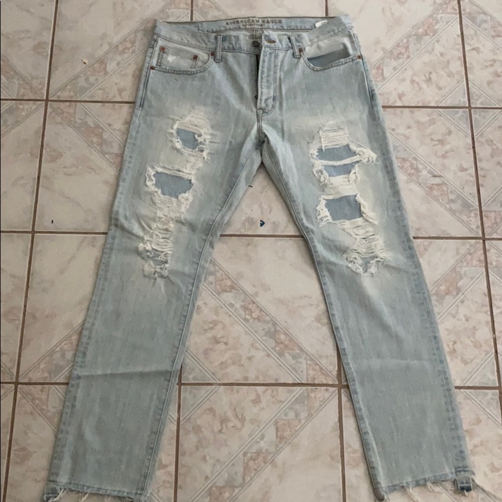 Light blue ripped jeans